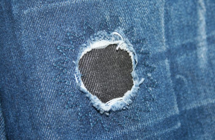 sewing patches on pants