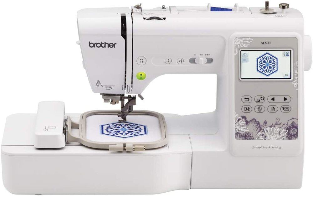 brother se600 sewing and embroidery machine isolated on white background